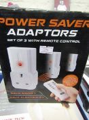 Set of 3 power saver adaptors with remote control , boxed