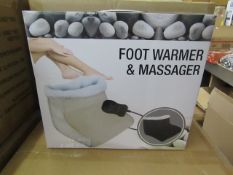 Foot warmer, beige colour, new and boxed.