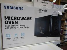Samsung MS23H3125AK microwave oven, tested working and boxed. RRP £95.00 at https://www.johnlewis.