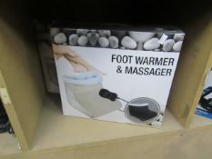 Foot warmer and massager, new and boxed.