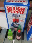 Slush Puppie slushie maker, tested working and lot comes with 4 slush puppie syrups being: Lime