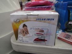 The dual-purpose steam iron. Unchecked & boxed.