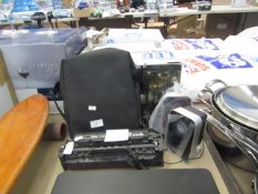 3x Items being: - HP LaserJet black ink cartridge, untested - COTEetCIEL travel kit bag for iPad -