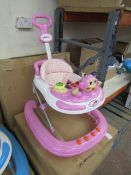 Pink coloured baby walker, new and boxed.
