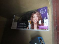 Instyler Titainium rotating iron, tested working and boxed.