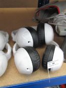 2x White skull candy headphones, both untested.