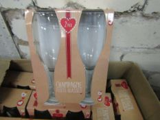 10 x packs of 2 champagne flute glasses , new and packaged.