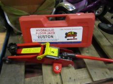 Hydraulic floor jack, new and in carry case.