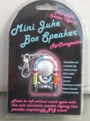 10x Mini juke box speaker keyrings. All new in packaging.