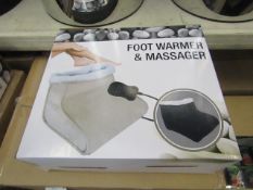 Foot warmer and massager black colour , new.
