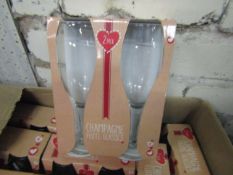 10 x packs of 2 champagne flute glasses , new and packaged.