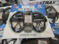 1x packs of 2 snow trax , new and packaged.
