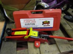 Hydraulic floor jack, new and in carry case.