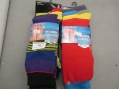 2 x packs of 3 mens design socks sizes 6-11 , new and packaged.