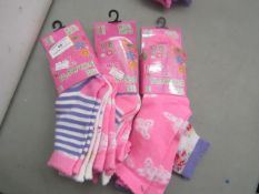 4 x packs of 3 pairs girls bows and flowers socks sizes 3-5 1/2 , new and packaged.