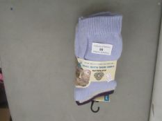 2 x packs of 3 mens design socks sizes 6-11 , new and packaged.