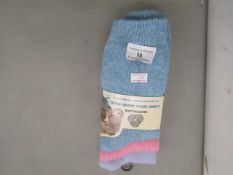 2 x packs of 3 mens design socks sizes 6-11 , new and packaged.