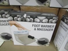 Biege Foot warmer and massager with soft fleece lining and hand held remote control, new and boxed