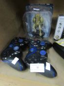 3 x items being 2 x PS3 controllers and a Doctor Who special 8 figure.