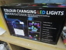 Indoor/outdoor colour changing LED lights , boxed.