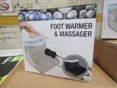 Foot warmer and massager , new and boxed.