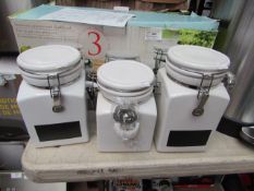 Set of 3 stoneware canisters with chalkboard , spoon missing , boxed.