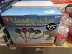 2 x 4 pc watering globes automatically waters your plants , new and boxed.