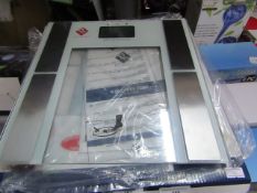 Renberg warranty card body scale , appears to be unused comes with batteries to.