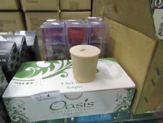 7 x Oasis pure soy candles , boxed.