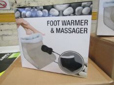 Foot warmer and massager , new and boxed.