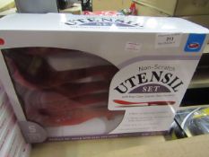 Non - scratch Utensil set with stay clean counter rest handles , new and boxed.