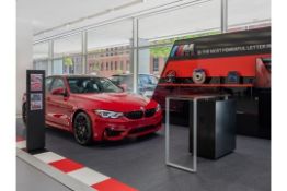 2x Large items form a BMW showroom being: - Presentation platform - BMW M ceiling element These