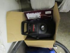 a Shop Vac Micro, looks to be for 12v and is missing hose upon quick inspection, raw returns and the