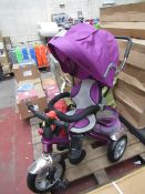Purple Childs Pedal trike/pram, converts from a push chair to a trike as the child gets older, has a