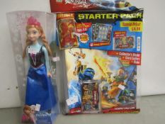 2 x items being a Disney Anna of Arendelle figure and a NinjaGo starter pack , both seem unused