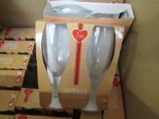 11 x  packs of 2 champagne flute glasses , all packaged.