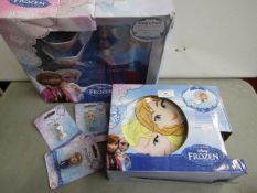 5 x items being 3 x Frozen character figures and 2 x Frozen Dinnerware sets , cup missing.