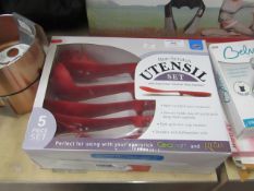Non - scratch Utensil set with stay clean counter rest handles , new and boxed.