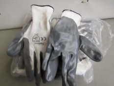 Pack of approx 12 x pairs of nitrile gloves , packaged.