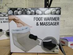 Beige foot warmer and massager , boxed.