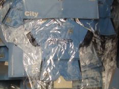 Box containing approx 250 Manchester City mini kit , seem unused and packaged.