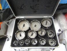 12 Piece hole saw set in metal carry case, complete with its own arbour, new.