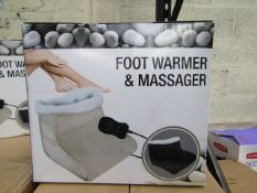 Beige foot warmer and massager , boxed.