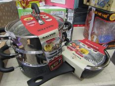 20 cm 3 tier pan and steamer and a 18 cm saucepan , all packaged and seem unused.