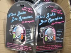 10x Mini juke box speaker keyrings. All new in packaging.