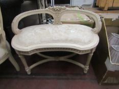 Ornate wood and fabric bench