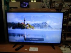 LG 43UH603V 43"4K Ultra HD HDR smart LED TV, come with stand and remote control in non original box,