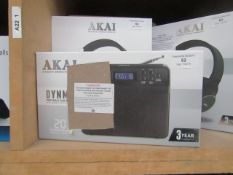 Akai Dynmx portable DAB radio with alarm clock function. Powers on & boxed.