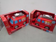 2 x Drive and talk fire engines , seem unused and packaged.