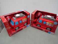2 x Drive and talk fire engines , seem unused and packaged.
